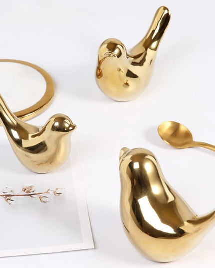 Figurine Little Bird dorée détails