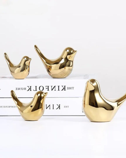 Figurine Little Bird dorée détails 2